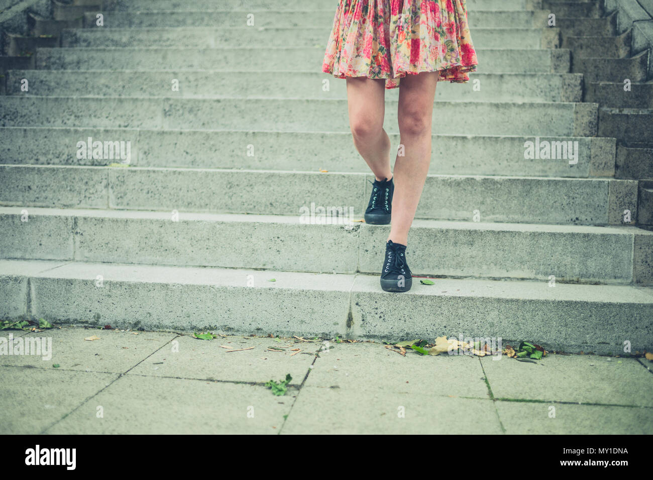 Legs walking down stairs hi-res stock photography and images - Alamy
