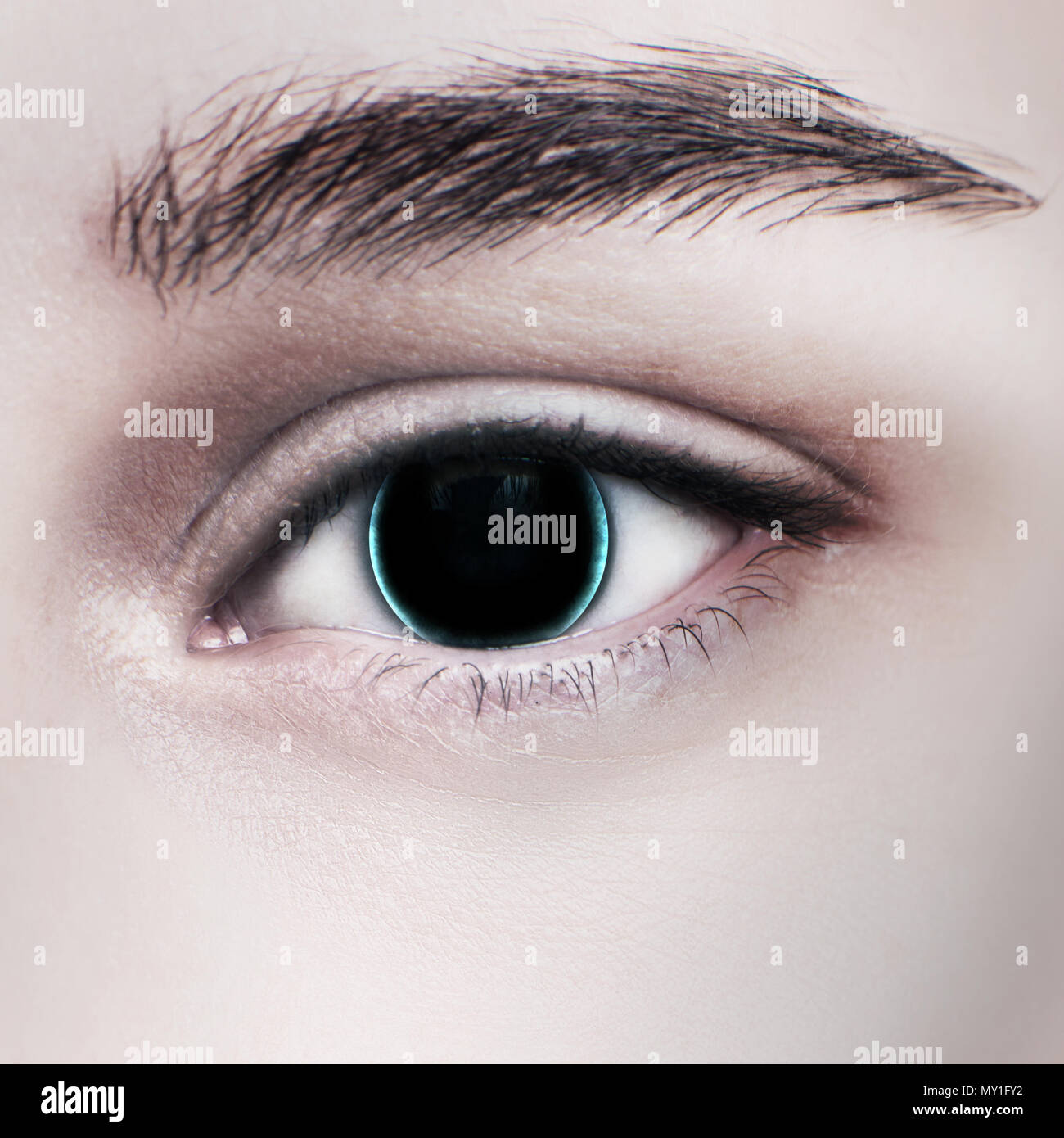 Beautiful glowing cyborg female eye. Stock Photo