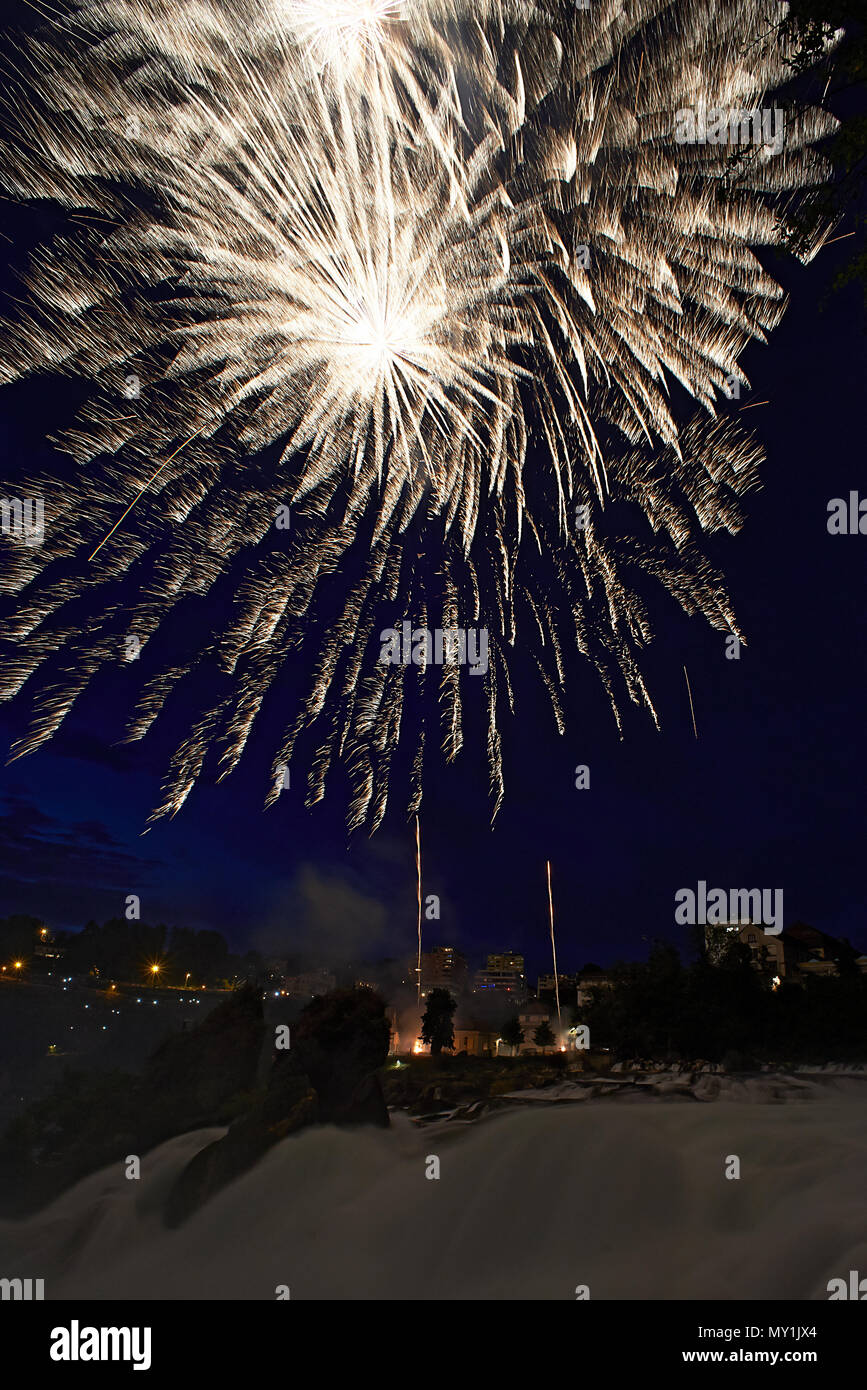 Amazing fireworks display in Schaffhausen where the river Rheine has its origin during Swiss national day Stock Photo