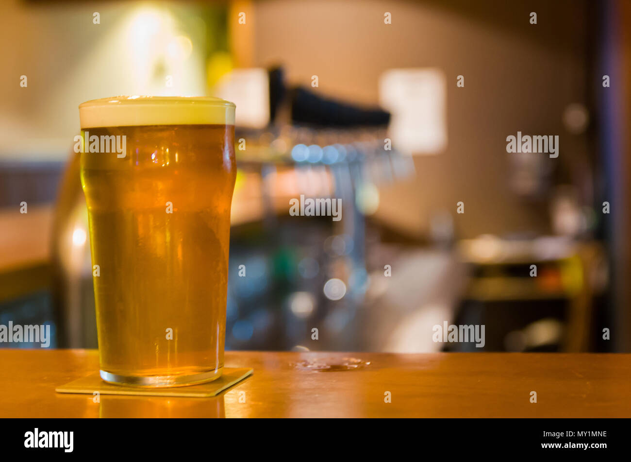 Glass Pint Of Beer On Top Of Bar Counter Brewpub Craftbeer Stock
