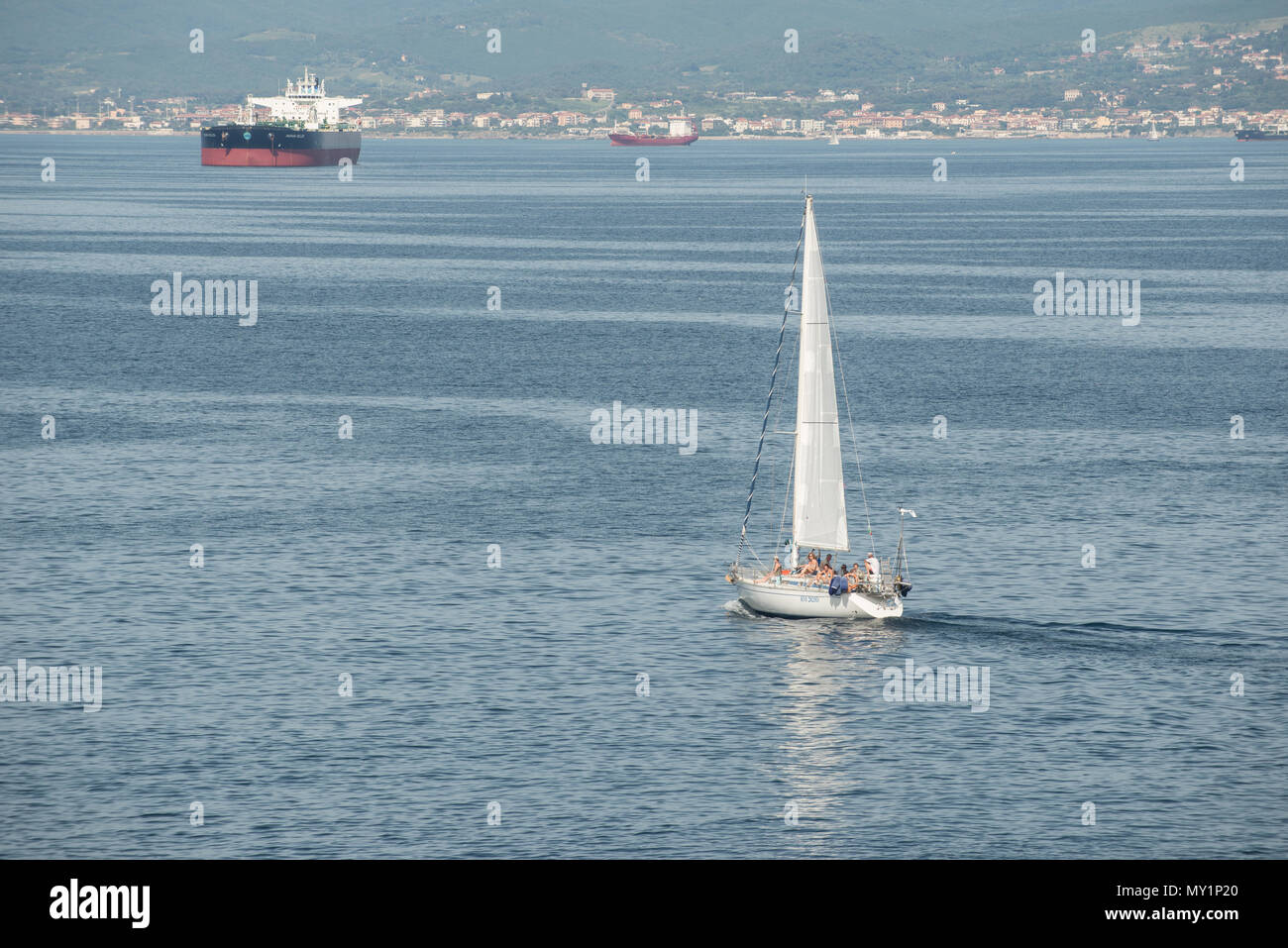 A sailing boat close to the tuscanian coast near Livorno, Italy Stock Photo