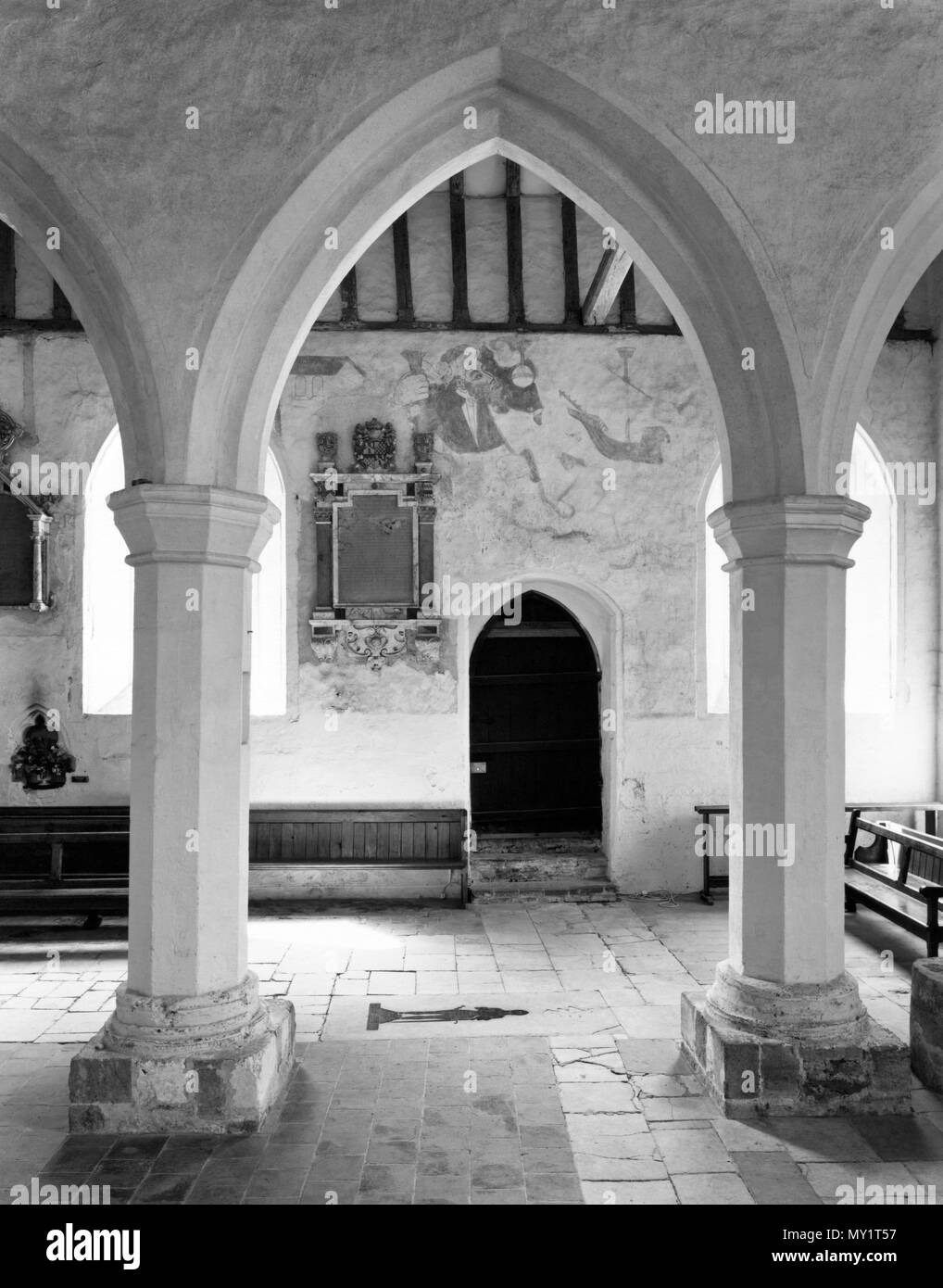 Remains of a C15th (c 1480) wall painting in the S aisle of Albury Park church, Surrey: head & shoulders of St Christopher carrying the Infant Jesus. Stock Photo