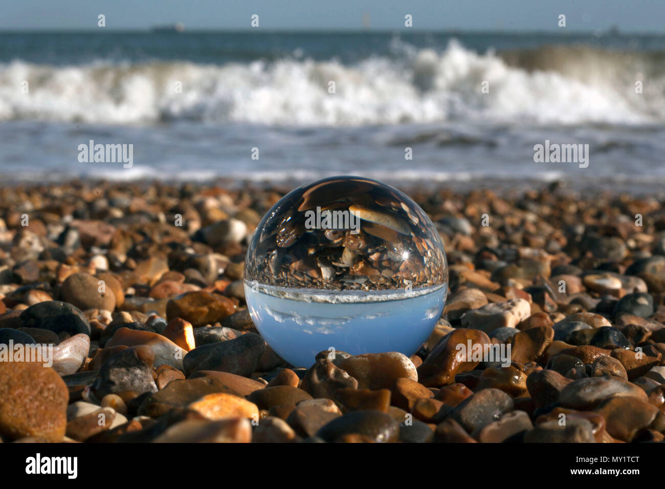 viewing the world through a crystal ball. Stock Photo