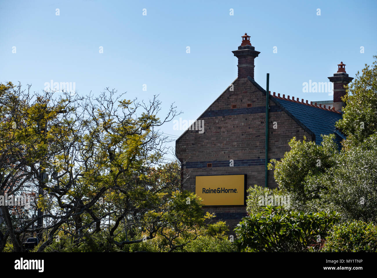 A view of the upper story (storey) level of a Victorian / Edwardian, Federation style building at 1360 Pacific Highway, Turramurra 2074 NSW Australia Stock Photo