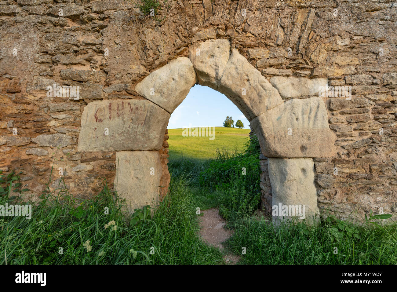 Entrance to ruin of a medieval Heiligkreuz chapel in Pfofeld, Franconia, Bavaria Stock Photo