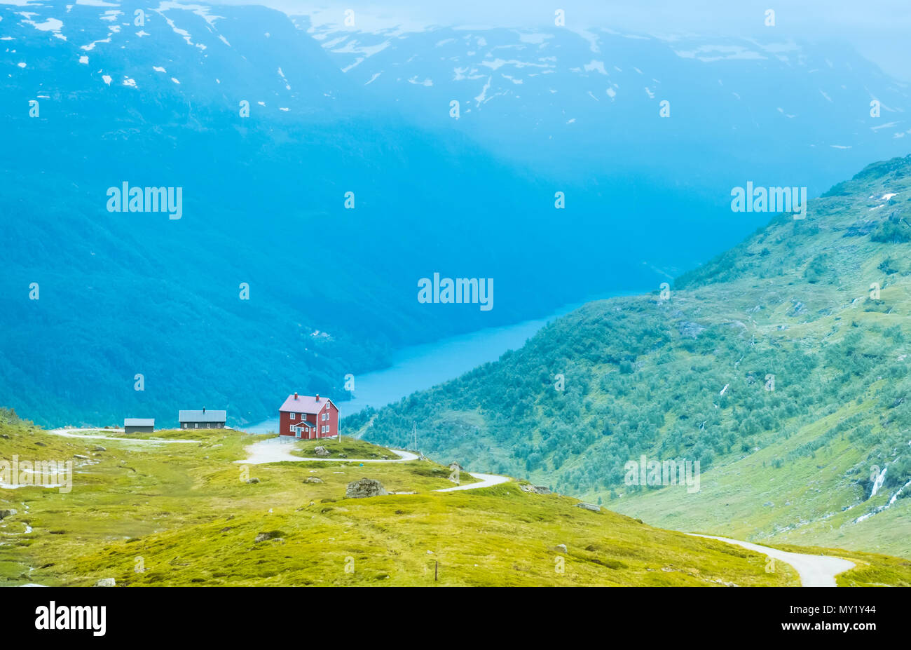 The lonely house on mountain lake in Norway Stock Photo