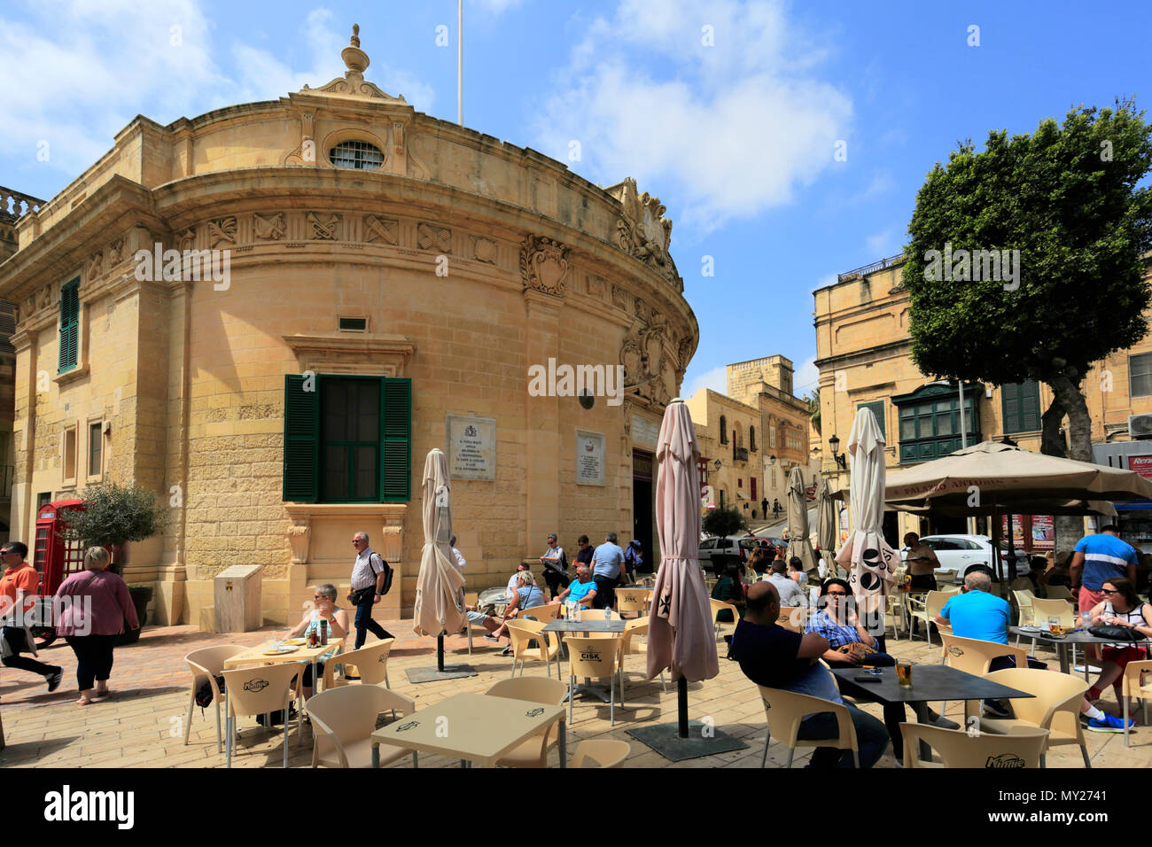 Summer view of cafe bars and the market place of Victoria City, Capital