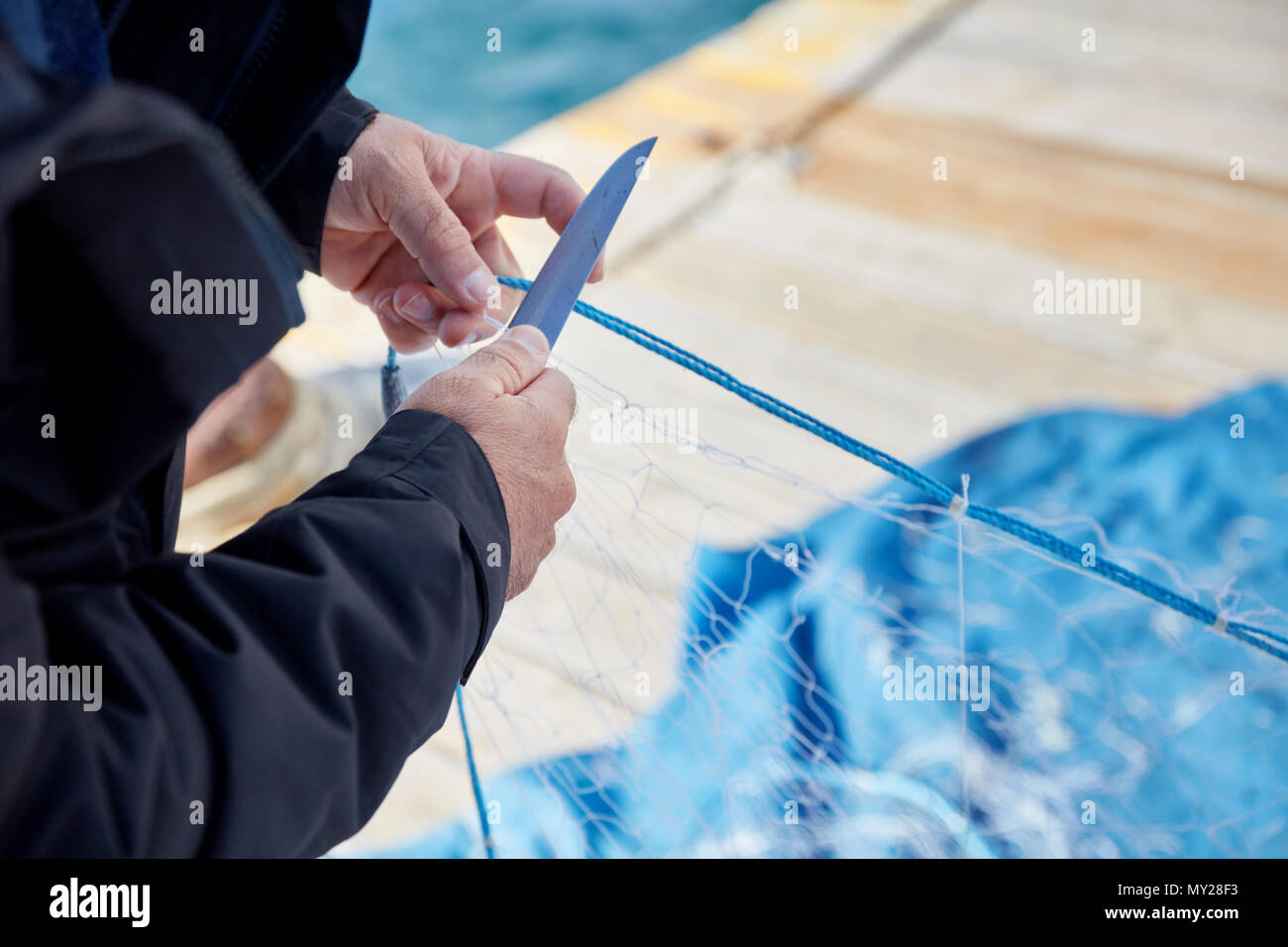 Fishing net and knife hi-res stock photography and images - Alamy