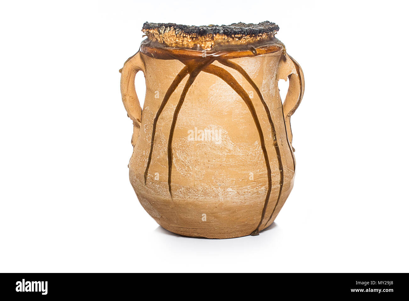 Honey jug isolated on white background Stock Photo