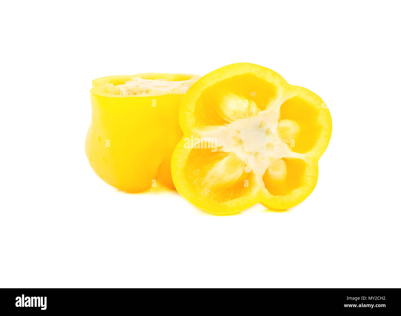 Delicious yellow pepper cut in half on white background Stock Photo