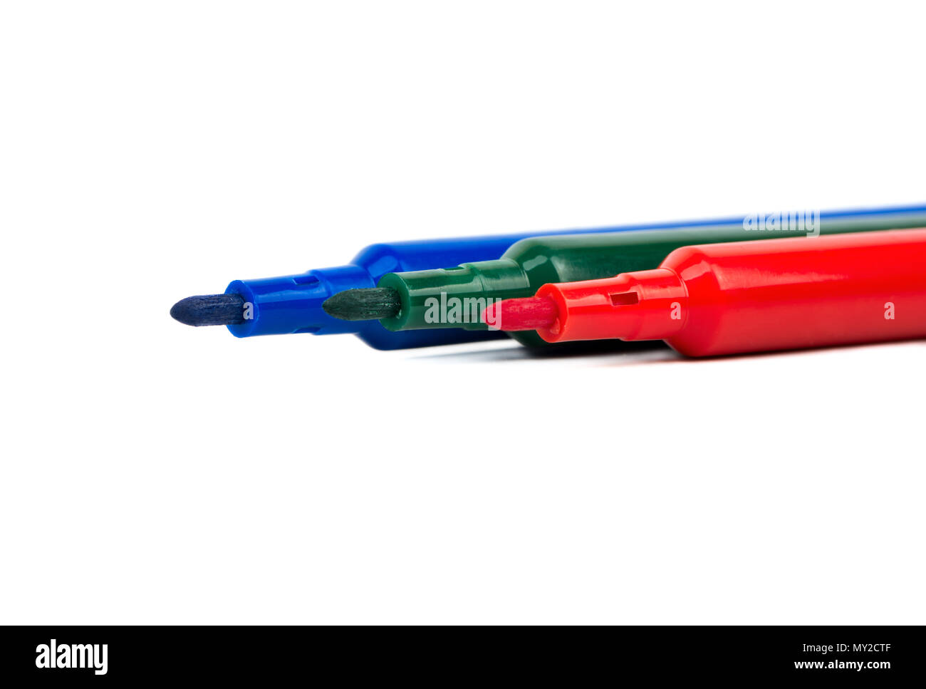 Three Color Marker Open three colored markers on white background closeup Stock Photo - Alamy