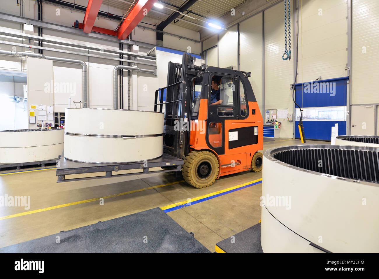 Factory of modern mechanical engineering - production of gearboxes for wind turbines - forklift truck transportation Stock Photo