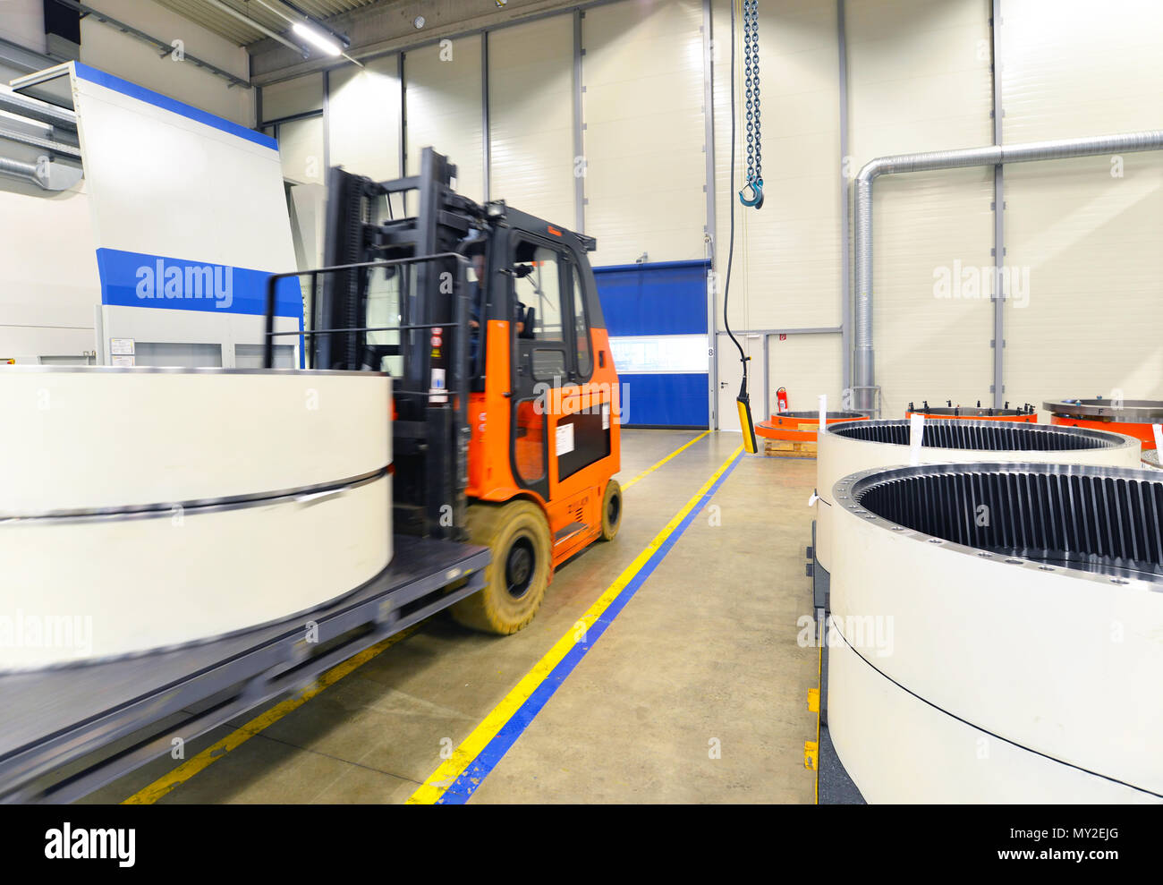 Factory of modern mechanical engineering - production of gearboxes for wind turbines - forklift truck transportation Stock Photo