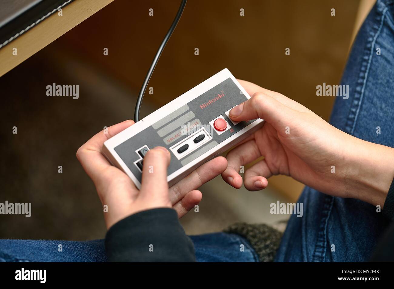 Nintengo NES,playing Super Mario 3 Stock Photo
