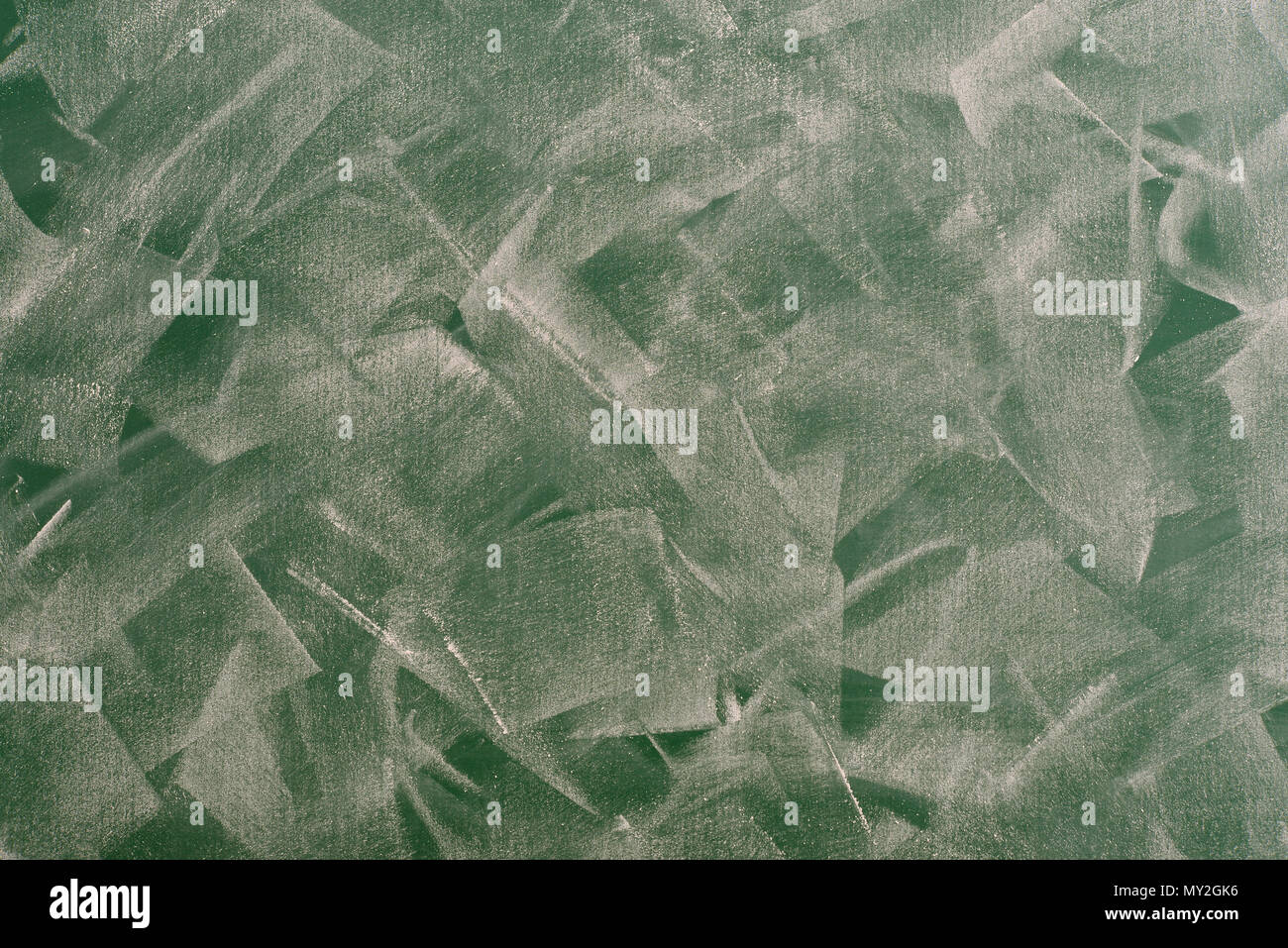 Green grunge dirty empty chalkboard, may be used as background Stock Photo