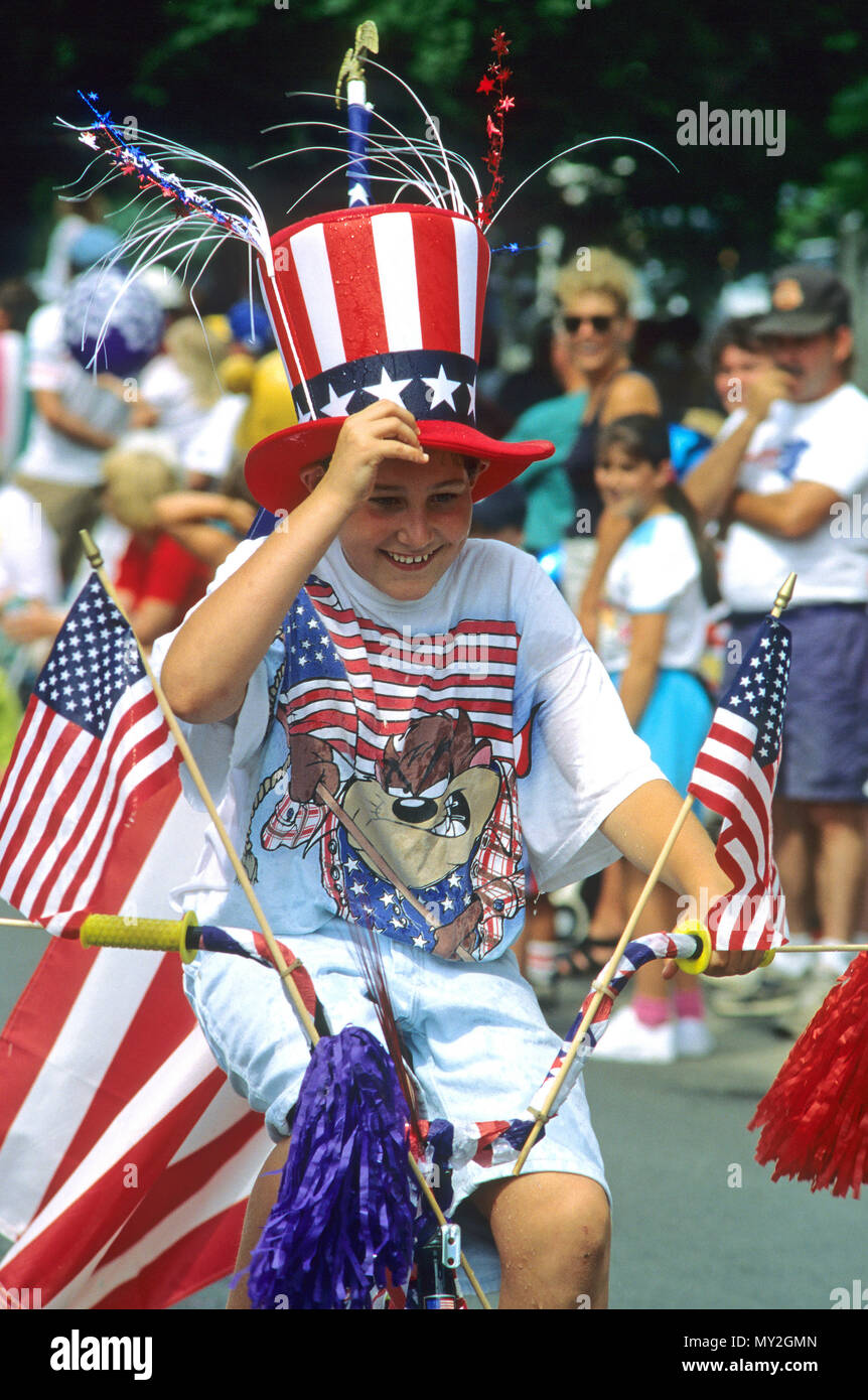 A young boy in a rural 4th of July parade in Middleboro, Massachusetts, USA Stock Photo