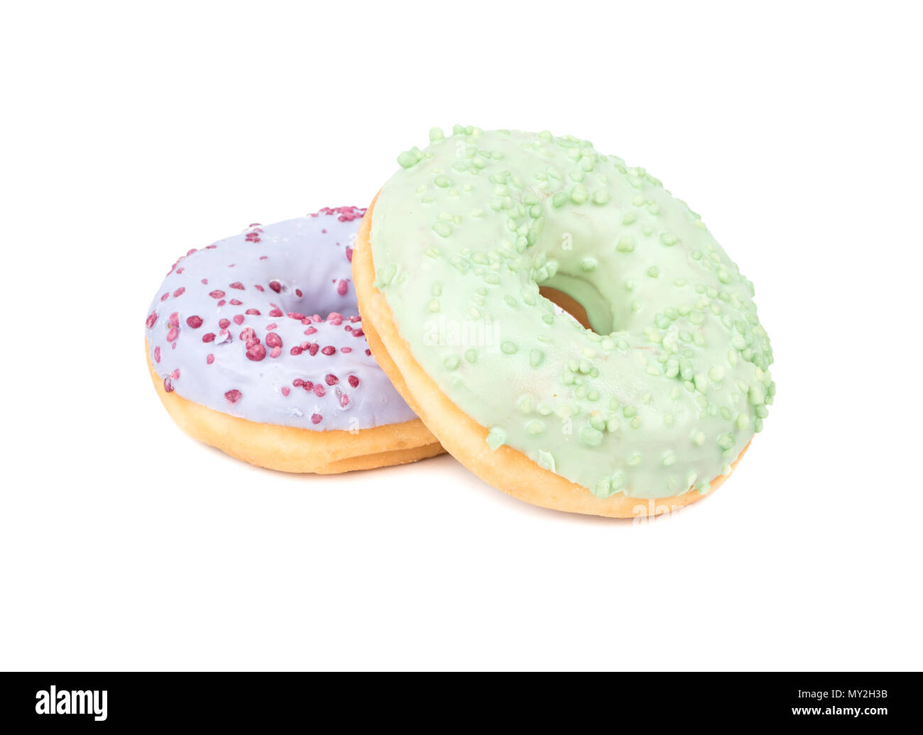 Two donut with blue and green icing isolated on white background Stock ...