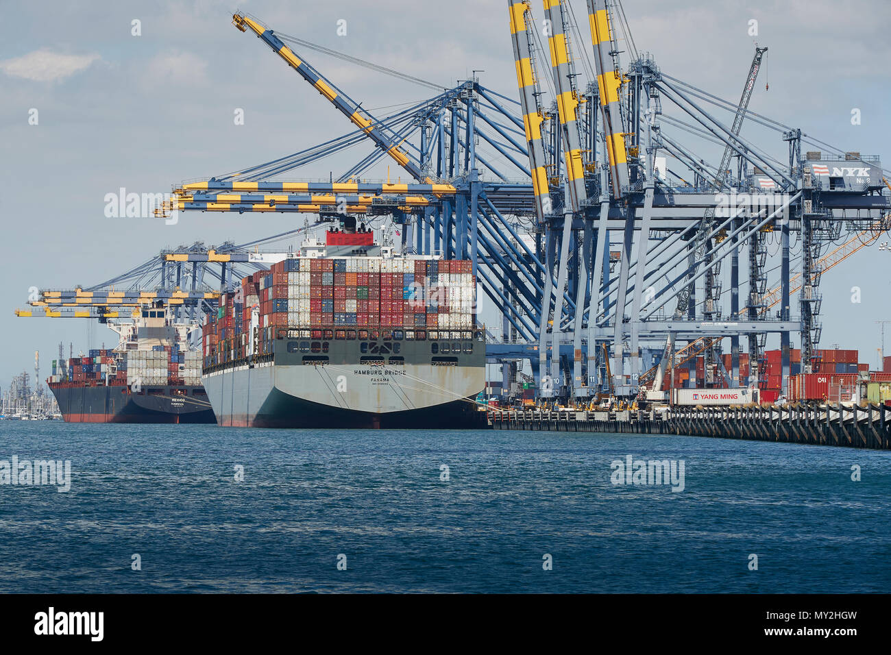 The Giant Container Ships, HAMBURG BRIDGE And MEXICO, Loading And Unloading In The Port Of Los Angeles, California, USA. Stock Photo