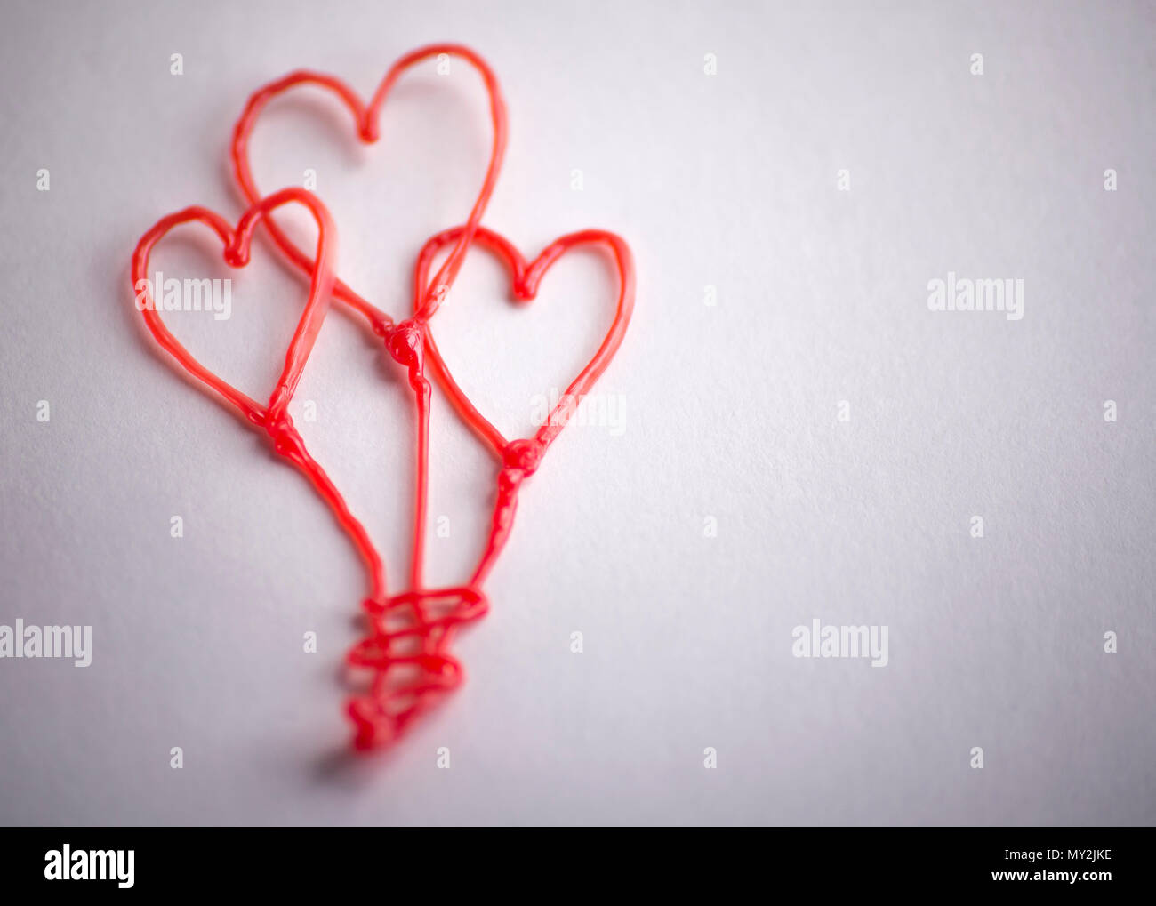 red heart drawn by 3d pen Stock Photo - Alamy