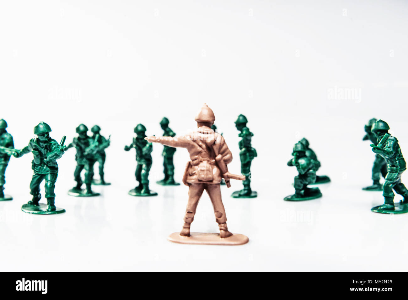 BATTLE OF SOLDIERS ON WHITE BACKGROUND Stock Photo