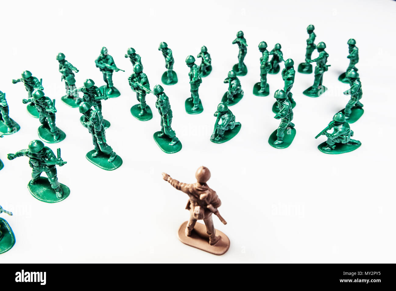BATTLE OF SOLDIERS ON WHITE BACKGROUND Stock Photo