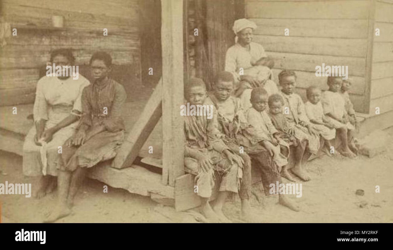 . English: half of a stereograph produced in 1874.Rectangular shaped object with rounded edges. It is oriented horizontally or more technically in a landscape orientation. Its width is 6.5 cm and its height is 3.75 cm. 1874. J.A Palmer 525 The way the Negro race is dying out (cropped) Stock Photo