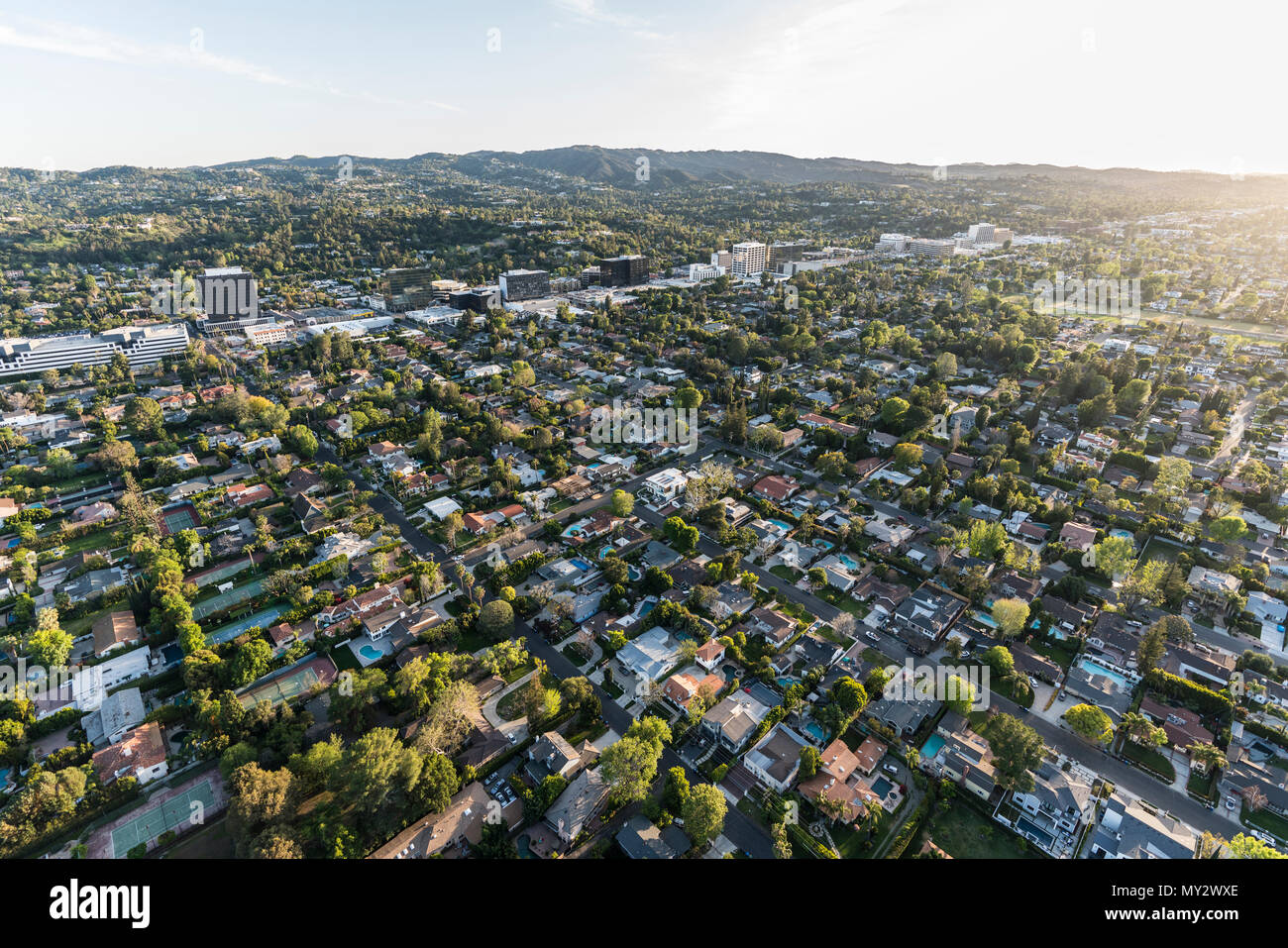 Late afternoon aerial view of Sherman Oaks and Encino in the San Fernando Valley area of Los Angeles, California. Stock Photo