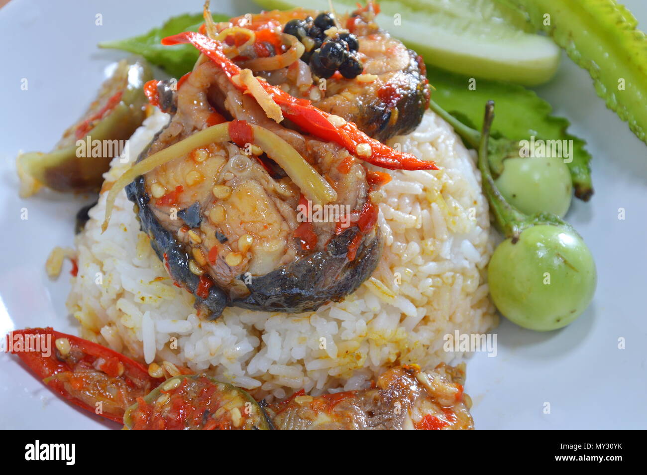 spicy stir fried catfish on rice Stock Photo Alamy