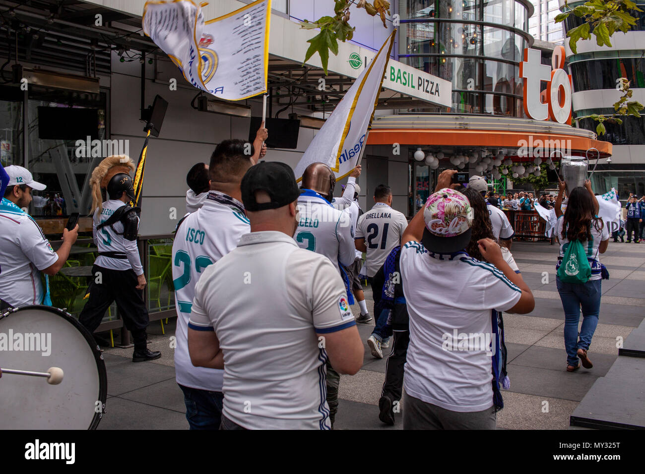 Real Madrid fans march outside Tom's Urban bar before the Champions League Final, LA Live. Stock Photo