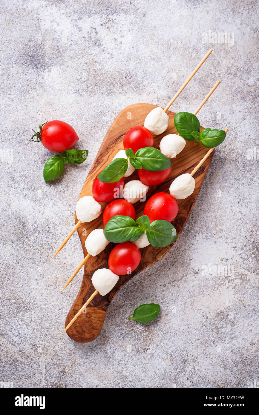 Traditional Italian antipasto caprese skewers with mozzarella, tomatoes