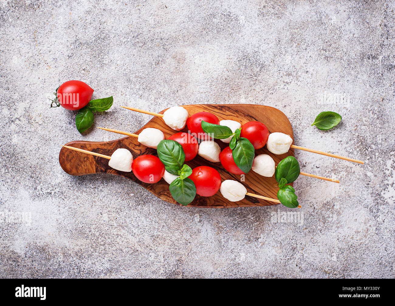 Traditional Italian antipasto caprese skewers with mozzarella, tomatoes
