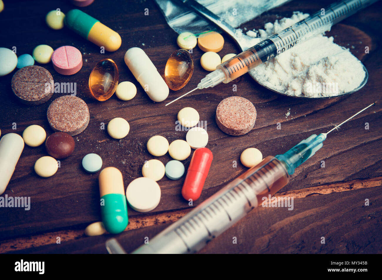 Drug concept. Use illicit Drug abuse .Addiction heroin.Injection, doping. Opium epidemic. Toning, selective focus. Stock Photo