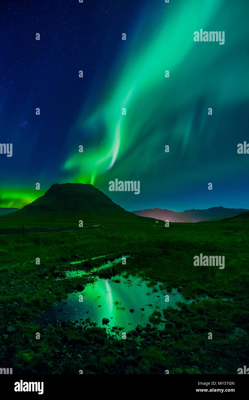 Aurora Borealis Mt Kirkjufell Grundarfjordur Iceland Stock Photo aurora-borealis-mt-kirkjufell-grundarfjordur-iceland-stock-photo