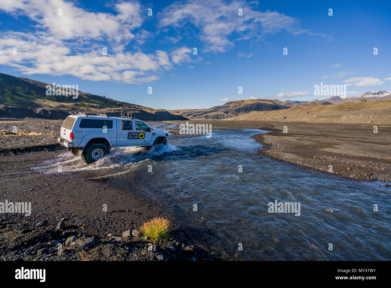 Jeep crossing a river in Thorsmork, Iceland Stock Photo