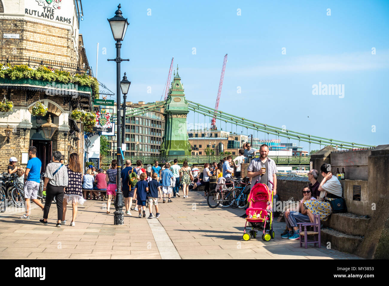 The Rutland Arms pub in Hammersmith, London is busy on a hot, sunny day. Stock Photo