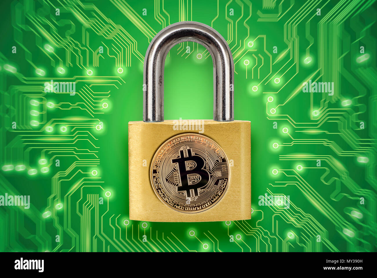 Broken padlock with bitcoin logo. Conceptual picture illustrating crypto currency hacking and theft. Stock Photo