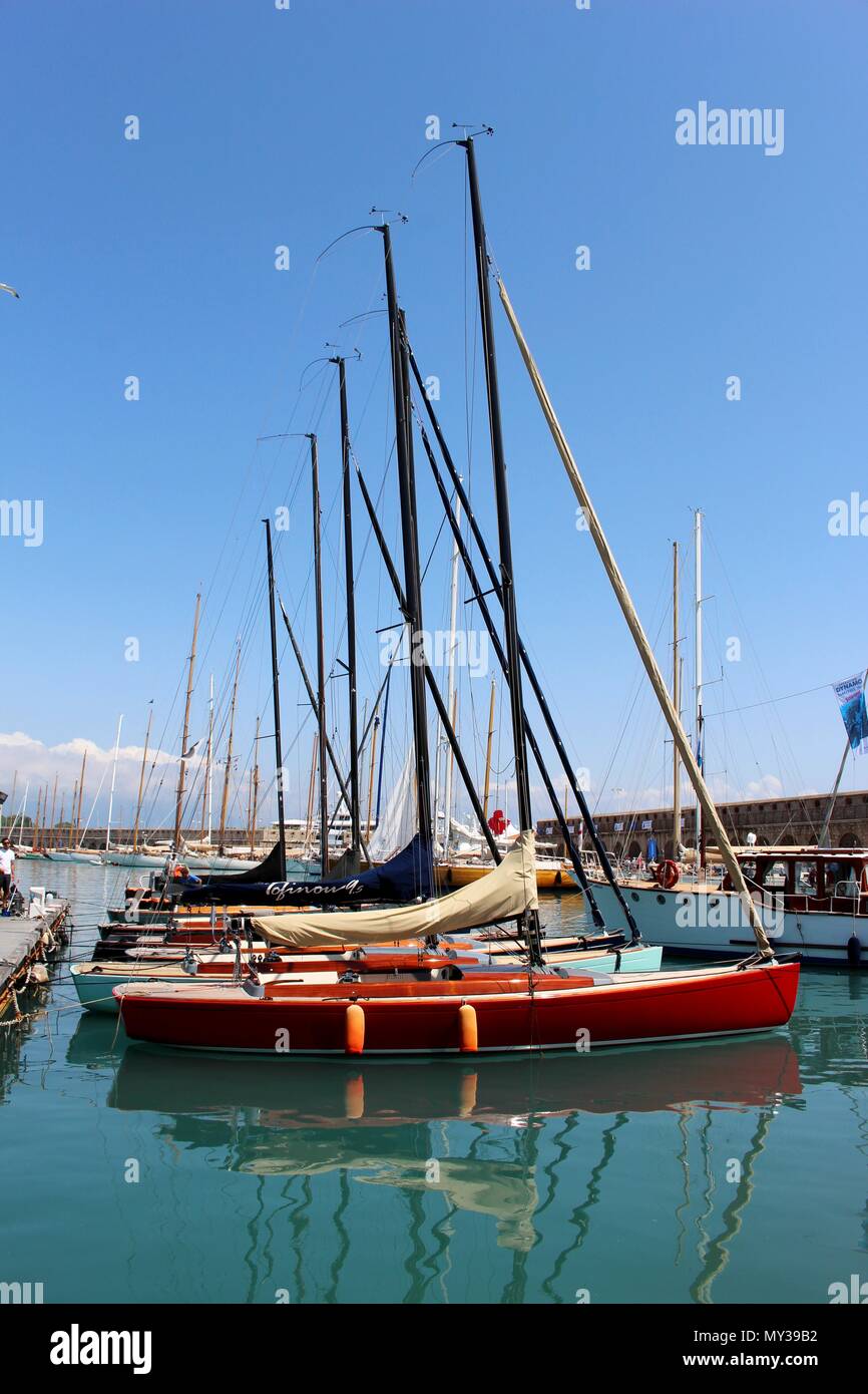 Antibes is home to the largest marina in the Mediterranean Sea, which has been attracting ships since before the times of the Roman Empire. Stock Photo