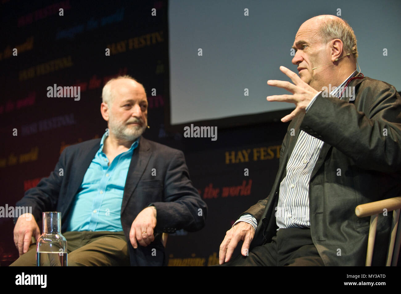 Andre Aciman & Colm Toibin speaking on stage at Hay Festival 2018 Hay-on-Wye Powys Wales UK Stock Photo