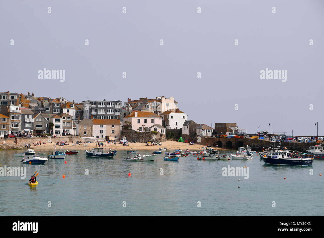 The waterfront at St Ives Harbour is a popular tourist destination, St Ives, UK Stock Photo