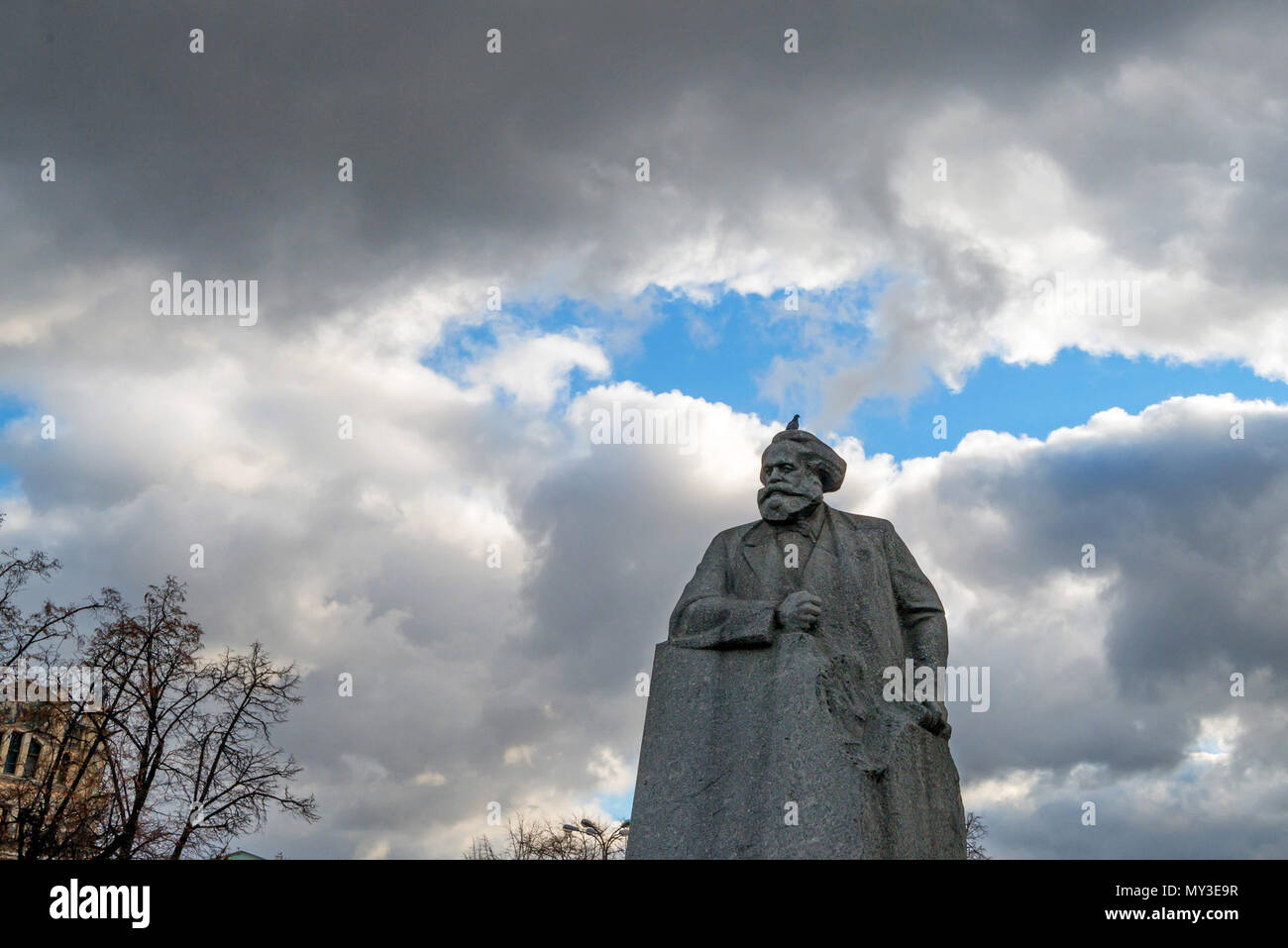 MOSCOW - NOVEMBER 2, 2014: Karl Marx statue in Moscow against cloudy sky Stock Photo