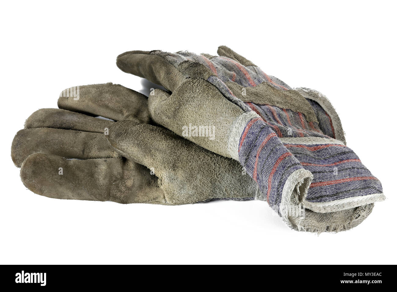 Old dirty leather work gloves hi-res stock photography and