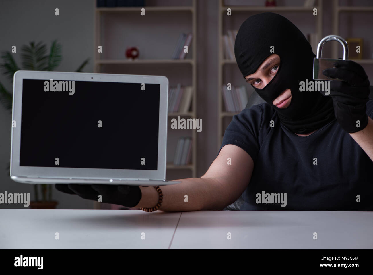 Hacker hacking computer late at night Stock Photo - Alamy