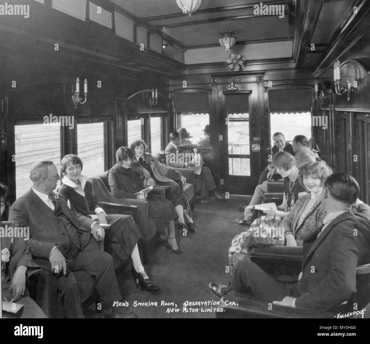 Passengers enjoy the ride in comfort in the Men's Smoking Room Observation Car onboard the C&A (Chicago & Alton Railways) flagship service between Chicago and St Louis, 1925. Stock Photo