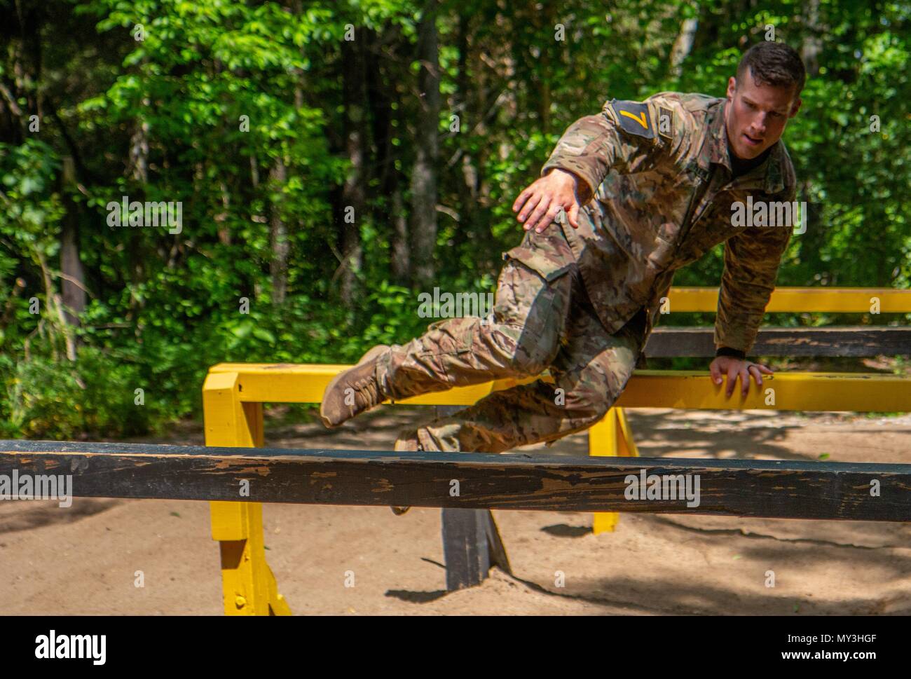 1st LT, May 24, 2018. Ryan Rodgers, 3rd Brigade Combat Team, 101st Airborne Division (Air Assault) navigates the six vaults obstacle during the Best Air Assault Competition at The Sabalauski Air Assault School May 24 at Fort Campbell. Air Assault qualified Soldiers of the 101st competed in several events such as a 12 mile road march, a written exam, a buddy run, rappelling, a medical evacuation and trauma lane, obstacle course and sling load inspection. () Stock Photo