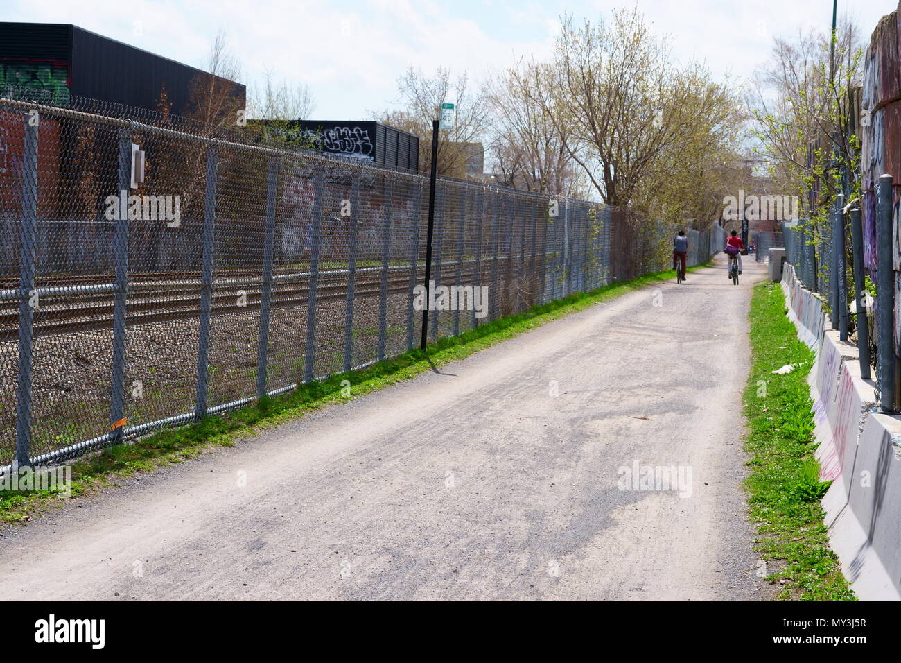 Montreal, QC, Canada -May 27th 2018 :  the bike path along the Canadian Pacific Railway in the middle of the city of Montreal is 4.5 kilometer long. T Stock Photo