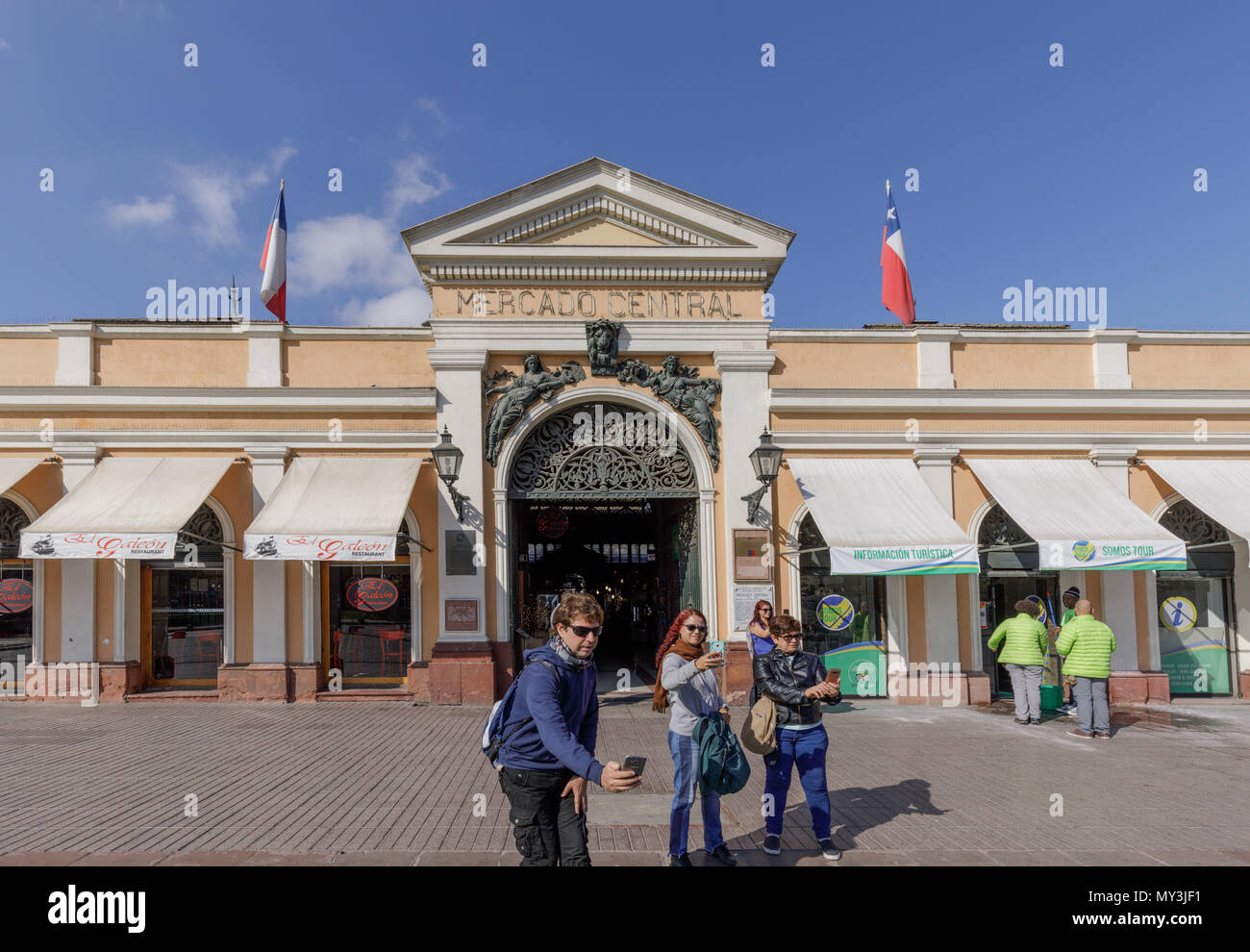 Santiago, Chile: Tourists take selfies in front of Central Market aka Mercado Central Stock Photo