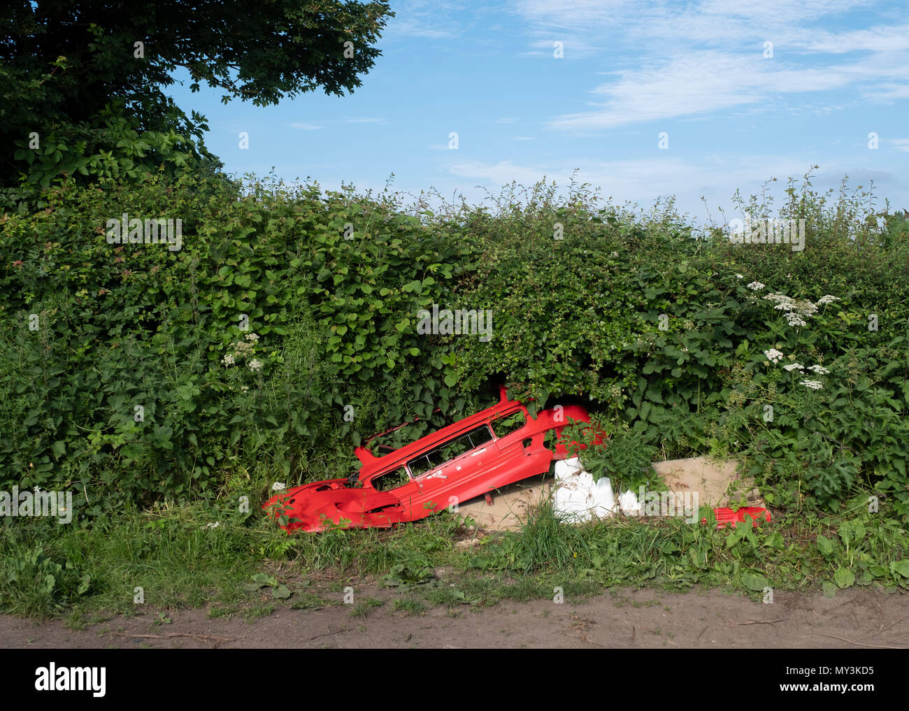 Car dumped in countryside hi-res stock photography and images - Alamy