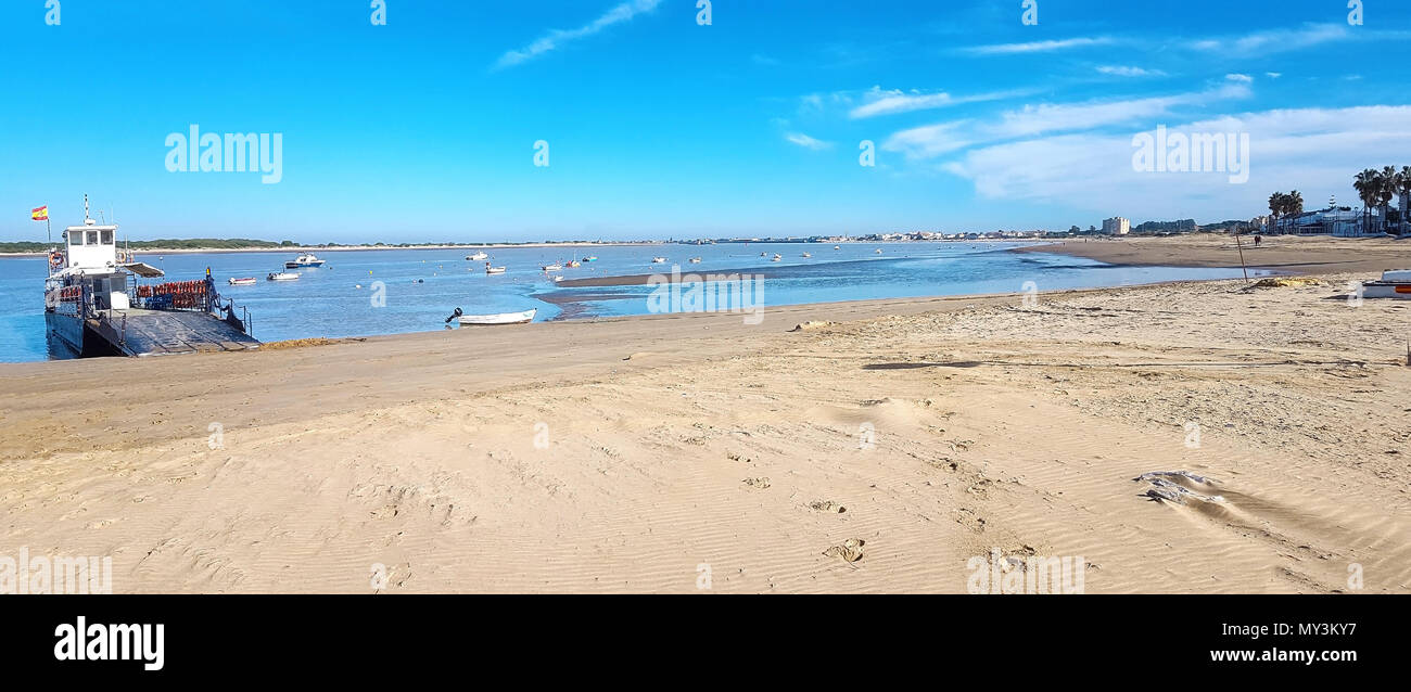 Guadalquivir river mouth seen from Bajo de Guia beach, in Sanlucar de Barrameda, Spain Stock Photo