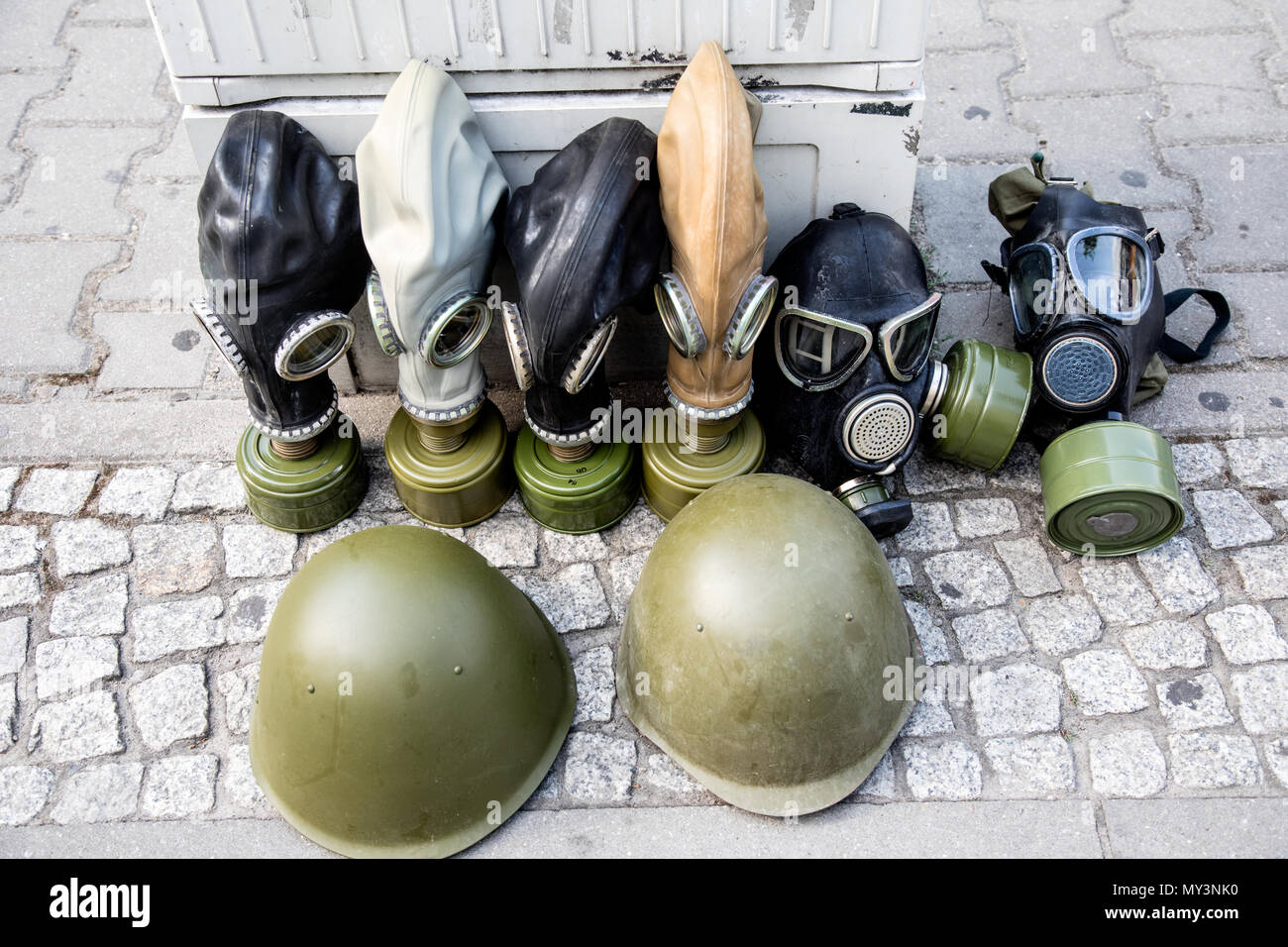 Helmets and Gas Masks Check Point Charlie Berlin Germany Stock Photo