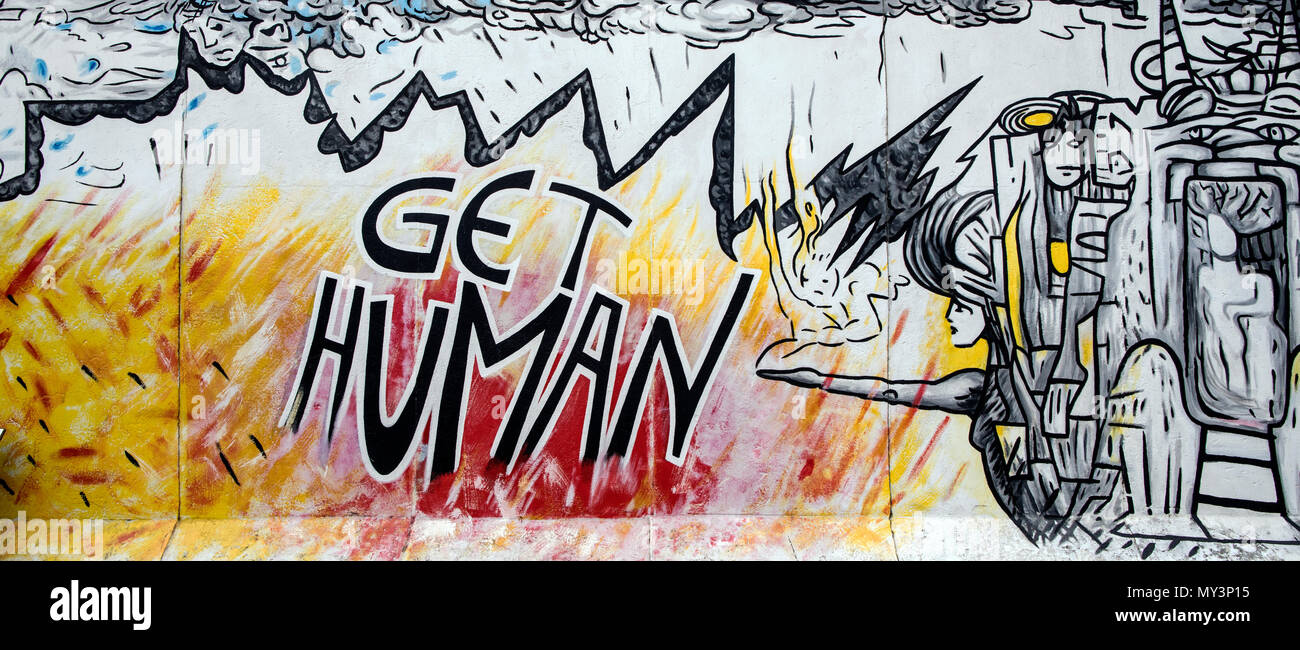 Get Human at The Berlin Wall Art On the East Side Gallery Berlin Germany Stock Photo